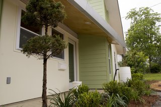 A mutual goal of the students and the resident was to create a home that was inviting to the community. The front and left side of of the home is the public space; the back and majority of the right side is the private space. The back porch is located on the left side of the house and can be seen through the front door. Photo courtesy of Jared Boudreaux and Tim Hayes.