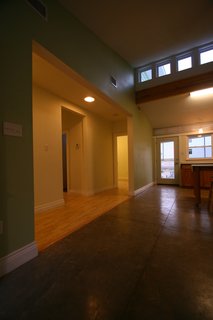 Because the house is on the north-south axis, the team added extra openings, including clerestory windows above the kitchen, to bring in additional light. Photo courtesy of Jared Boudreaux and Tim Hayes.