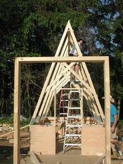 Shown here, construction under way. One hut up, four to go.