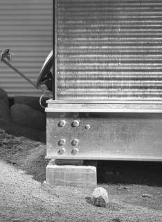 Small "Hybrid Prefab" Home in the Desert - Photo 7 of 10 - Eight carefully placed bolts in the joints in the steel frame absorb any movement, allowing the home to rest on small footings and meet California’s strict seismic standards.