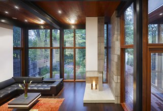 This shot of the Ravine House's interior shows its glazed back facade and clear geometry.