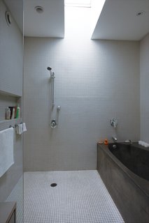 The main bath has a concrete tub that Fleming cast to fit his wife’s body.
