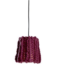 There were actually a handful of yarn lampshades at the fair—the others I saw were from Mut and Ana Krâs at the Salone Satellite—which, as a novice knitter and fan-of-craft, I loved. Granny, a chunky burgundy pendant by Pudelkern Design for Casamania, was inspired by cold winters in the Alps, and made from fire retardant wool.