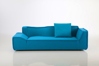 Though Katy Meyer-Brühl's Ladybug was introduced last year, this textured upholstery with oversized piping adds a new dimension to the gently undulating sofa for Brühl.
