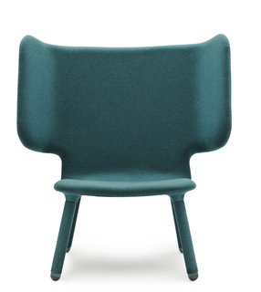 The "wings" on Valdemar, this new upholstered chair from industrial designers Martin Kechayas and Christian Nørgaard for Normann Copenhagen, make sitting into a blissfully solitary pleasure. The upholstery covers the legs, too, giving a complete color block look, and it's comfy, too; You can lean to either side and settle in with a book and forget about the rest of the room.