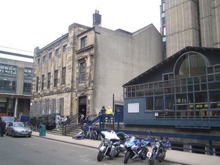 Here are three buildings (with that brutalist tower glimpsed in back) that are to go in favor of the new Steven Holl building. The Victorian building at the end of the block is home to the Vic, a rather grungy student union and music venue that has birthed a number of Glasgow bands like Franz Ferdinand.