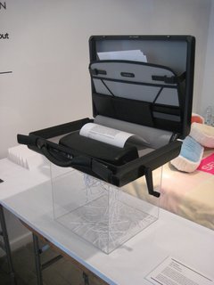 Uncomfortable Conversations - Photo 4 of 7 - In Case by Materious. A briefcase that conceals a paper shredder for the corrupt businessman.