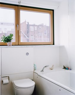 Luke Tozer invested in a rainwater-harvesting system for the house that meets part of the family’s need for domestic water and is used to flush the four toilets in the house.