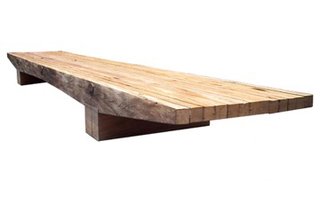 Motta’s Caju, or "cashew" table is low-slung and meant to patina to an ashen hue over time.