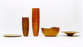 An array of Carmona designs, including the Fino tray and vases, the Governador bowl and the Shallow Fruit Bowl, all made from fallen Brazilian trees and some stitched with natural fiber.