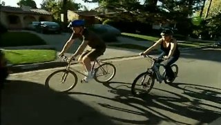 In a still from the show Living with Ed, Begley takes a fan on a bike ride.