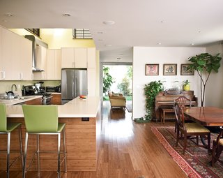 Developer Michael Kyle and his wife Joanne Higgins mix old and new in their living and kitchen areas.