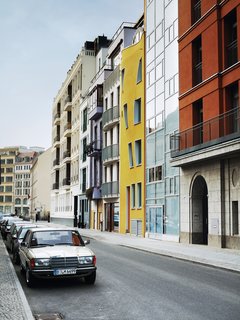 The East Berlin neighborhood is entirely new, zoned for town-house construction. Each floor of the house is more or less completely open from front to back, so the interior gets plenty of light in spite of the long, narrow lot.