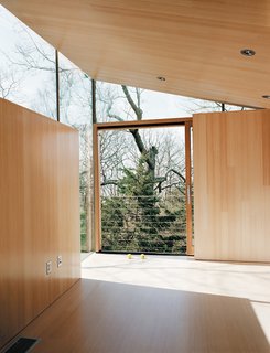 The bright, reflective surface amplifies natural light and bathes the interior in a warm glow even when the New England sun isn’t cooperating.