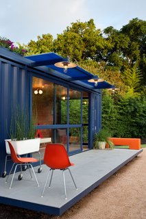 "Stacey’s property abuts an artists’ colony, so she didn’t want the container to wall off her friends, so we used a bamboo hedge behind it as a way of protecting it from sun yet remaining welcoming to her neighbors."