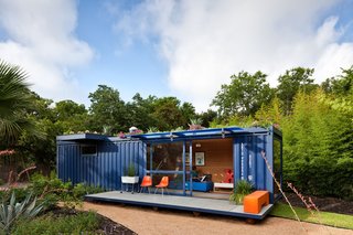 9 Small Spaces With Color - Photo 1 of 9 - In the hands of Texas architect Jim Poteet, this blue steel shipping container becomes a guesthouse for visiting artists in San Antonia.