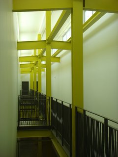 Adaptive reuse projects are Db+P's specialty. The pasta factory's original industrial architectural elements are highlighted by lime-green paint, alluding to the past life of the building and natural light from clerestory windows floods the wide, double-height corridors.