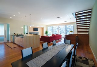 This approach allows for an extremely efficient use of space, leaving the smaller, existing bedrooms and living areas to be used as guest spaces and the new construction to be as large and open as possible. The material palette remains in context, while the execution and form make a decidedly modern statement.