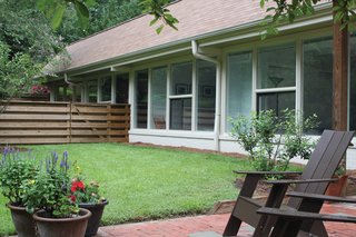 Bizios Architect gave the Rugby house a new lease on life by rearranging a few walls, adding 400 square feet, a screened porch, decks and patios.