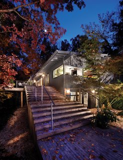 The Wheeler house, designed by Cherry Huffman Architects is a positive demonstration of an ongoing client-architect relationship and rests downhill from the street on a secluded, wooded site.