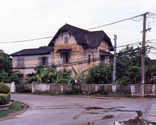 Living in Laos - Photo 2 of 14 - These colonial houses are around the old center of town. They were originally residential houses built between 1914 and 1930 for the French colonial officials and administrators. The French brought Vietnamese masons and carpenters since they were already trained to build French style houses. Most of these laborers settled in Ban Anou, the old Vietnamese "village" in Vientiane.