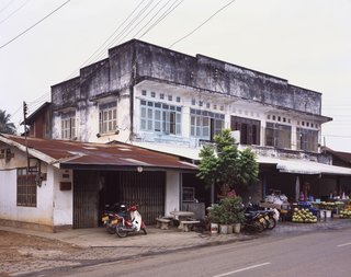 Living in Laos - Photo 13 of 14 - This building is fairly common in Vientiane, with the storefront at the bottom and living quarters in back and on top.
