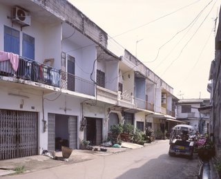 Living in Laos - Photo 14 of 14 - This is an example of a non-commercial street dating back to the 1960s. I love the one house in the middle that is so ornate—it really stands out.