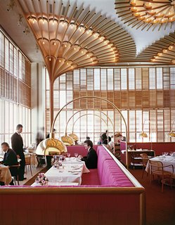 Warren Platner designed the American Restaurant in Kansas City in 1974 as part of a complex of modern buildings commissioned by the Hall family of Hallmark Cards. He described the bentwood, brass and lipstick-red interior as "like a huge lace Valentine."