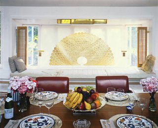 The house included a number of interior windows and window seats, which he called "terraces," including one with a view of the dining room.