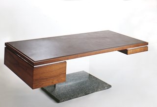 A 500-pound executive status symbol? Yes, in the form of a $6,000 leather, wood, and bronze desk designed by Platner. "I thought of these things as trees," he said.