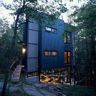 A Modern Dark Tower - Photo 3 of 5 - Playfully christened La Tour des Bébelles, the three-story, steel-framed tower has shown itself to be the ideal summer retreat: secluded, perfectly positioned near Ontario’s Otter Lake, and encouraging of its inhabitants to spend time outdoors.
