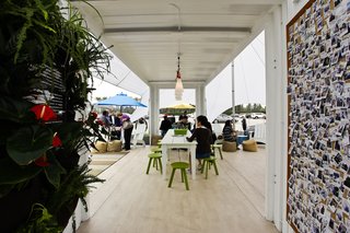 Hyundai Ride and Drive - Photo 6 of 16 - Entering the container doors, you’re greeted by a Woolly Pocket vertical garden to your left and an assortment of Loll Designs outdoor furniture.The empty space carved out by the disassembled walls of the container help to complete a room-like feeling with a relaxing communal area.