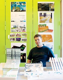Marcel Wilson in his studio, surrounded by examples of his recent work.