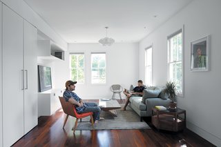 A pair of photographers employed a pair of architects (they’re all buddies) to transform an aging schoolhouse into a modern marvel.