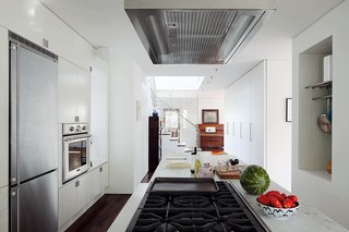 A view of the stretching Carrara marble countertop.