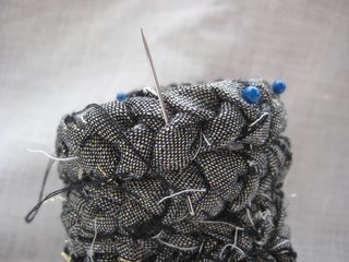 Braided Rag Vessels - Photo 10 of 14 - 7. Using a needle and thread, stitch between each row. Remove the pins when complete.