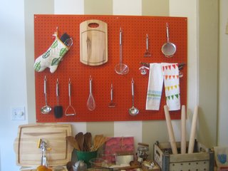 Wageman takes a cue from Julia Child with her cheerful pegboard organizer.