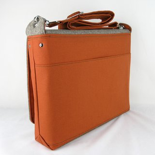 Zaum's Eco Portabile Media bag, made with organic cotton canvas and wool felt. Also available in blue, black, red, white, and green.