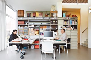 This Home Takes Recycling to the Next Level - Photo 4 of 13 - In the work space, custom shelving houses crafting materials (Blans is a keen needle woman) and objects, including toys from Blans's mother's childhood.