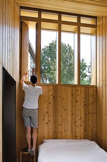 The cabin is partially underground, so the designers drew on the sun via skylights and strategically placed windows to light and heat the structure.