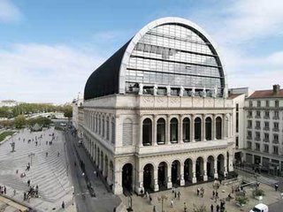 Midgette's qualms with Jean Nouvel's opera house in Lyon are many. Not least of which, the rough effects of the grates on the floor on high heels.