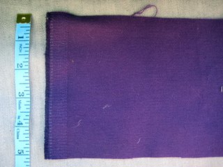 First, measure out and cut two strips of fabric. Mine were five inches wide by 32 inches long but those numbers aren't set in stone! Just remember, you're going to fold these strips in half length-and-width-wise, so pick your dimensions accordingly (not too thin or too short, unless you want a teensy sling in which case you would be on the right track).