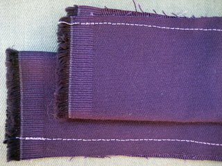 Sew along the rough edge about a quarter of an inch in, from end to end.
