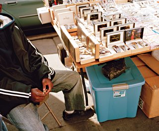 A street vendor has watches for sale.