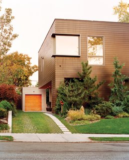 John Hsu's house is a concrete modernist box nestled amid "suburban eclectica," as architect Drew Lang characterizes the neighborhood’s prevailing style.