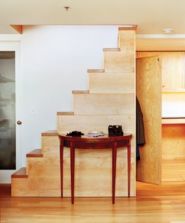 In a former shipping and receiving room, Kidd's design-builder Eric Wolf inserted a custom-crafted freestanding stair.