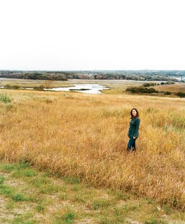 The tall vegetation surrounding Carrie Grassi, Freshkills Park land-use and outreach manager, grows atop what was formerly the world’s largest landfill: 150 million tons of (mostly) garbage, accumulated over more than half a century.