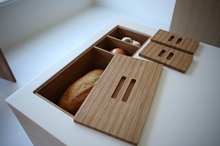 Make that bread box and bread bin. These In-Counter Storage Modules also help keep the prep area clear.