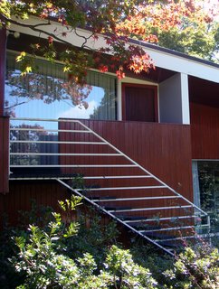 Fashioned out of steel, the delicate exterior staircase—one of Breuer's specialties—leads up to the master bedroom on the second level. Photo by Diana Budds.