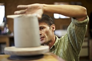 Artist Michael Wisner not only hand-dug the clay on site at Newton Vineyard for his limited-edition wine chillers and coaster sets, but hand-built and shaped each object as well.